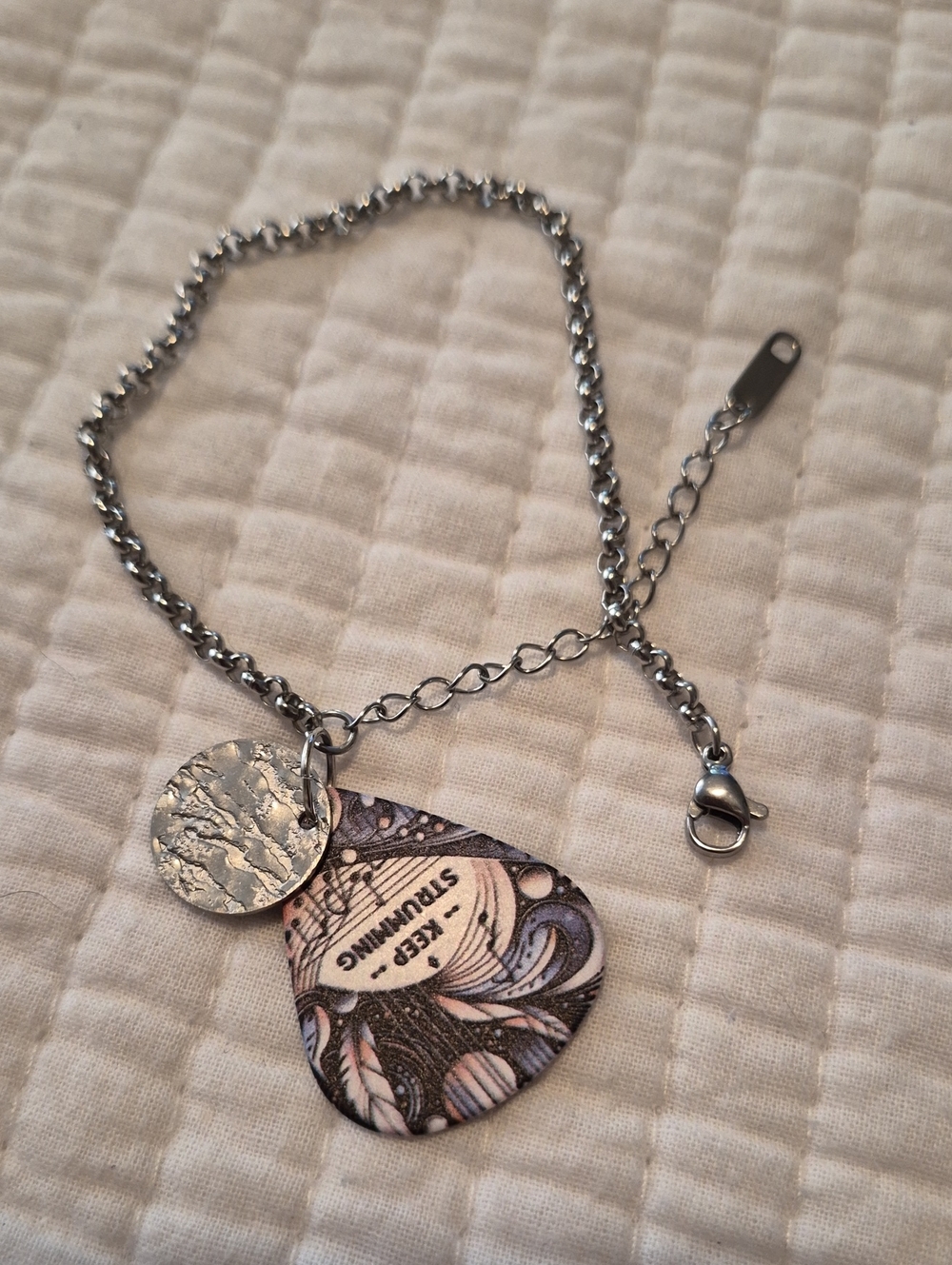 Stainless Steel Bracelet with A Guitar Pick Pendant And Hammered Charm